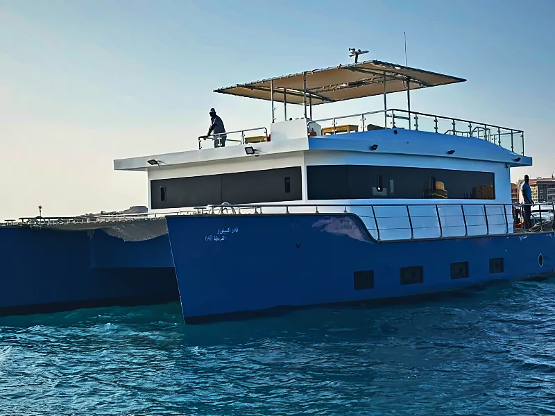 Qader Explorer catamaran with its sun deck and canopy